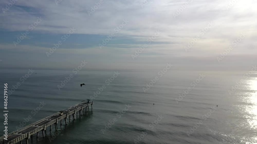 Aerial View Of Jacksonville Beach Pier By The Atlantic Ocean Coast In Florida. Temporarily Closed For Renovation. Aerial View Of Jacksonville Beach Pier By The Atlantic Ocean Coast In Florida. Temporarily Closed For Renovation.