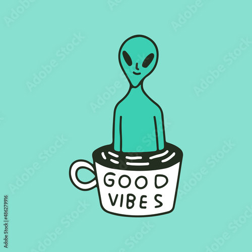 Funny alien in cup of coffee with good vibes typography, illustration for t-shirt, sticker, or apparel merchandise. With retro cartoon style.