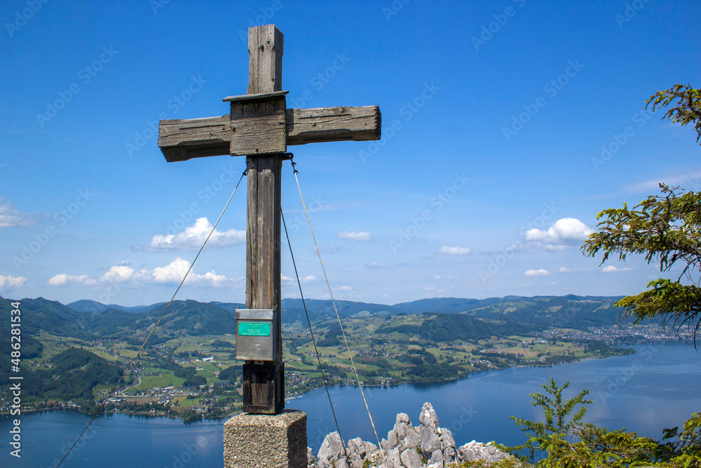 cross on the top of Kleiner Schonberg, 894 m. Austria landscape