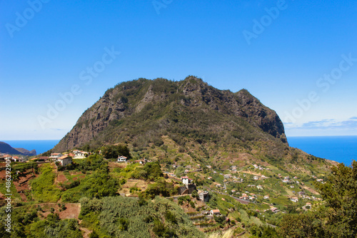 Local village and houses scattered upon a mountainous peak in north Madeira island, Portugal. © Oli French