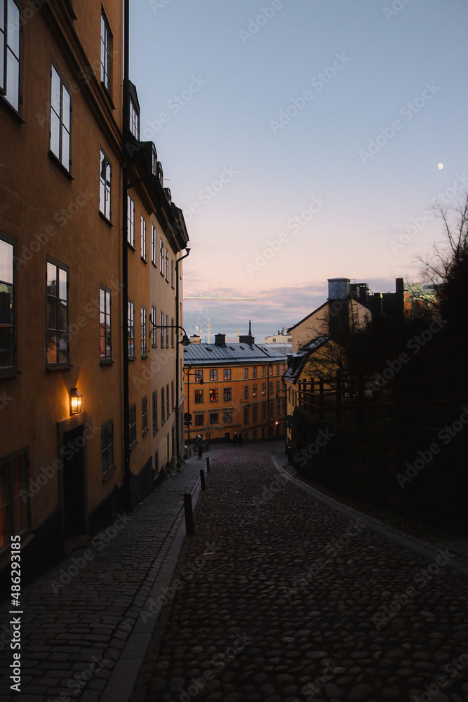 Traditional Swedish backstreet at sunset, on the island of Sodermalm, Stockholm city, Sweden.