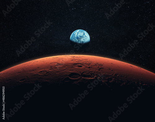 Mars, the red planet with detailed surface features and craters in deep space. Blue Earth planet in outer space. mars and earth, concept photo