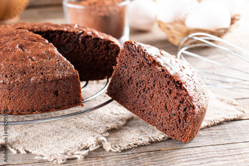 Clasic chocolate sponge cake Pan di Spagna selective focus. photo