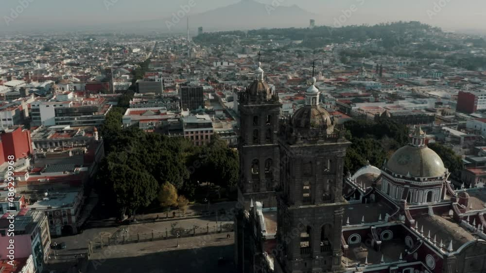 Bell Towers Of Puebla Cathedral With Panoramic View Of Historic Centre Of Puebla In Mexico. aerial orbit Bell Towers Of Puebla Cathedral With Panoramic View Of Historic Centre Of Puebla In Mexico. aerial orbit