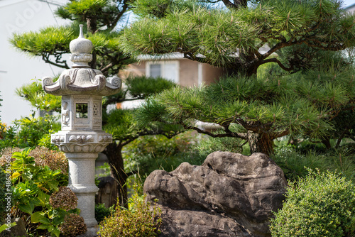 Photography traditional japanese stone lantern in a garden
