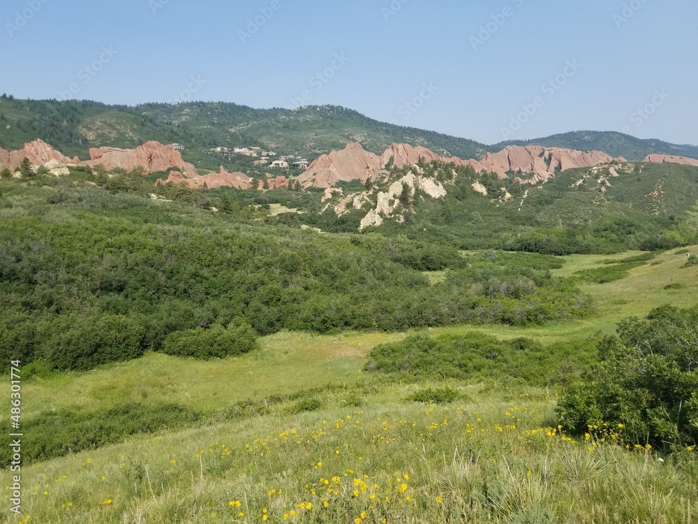 Fototapeta premium Red Rocks Sandstone Grass Sunshine and Beautiful Hiking Trails in Roxborough State Park Colorado