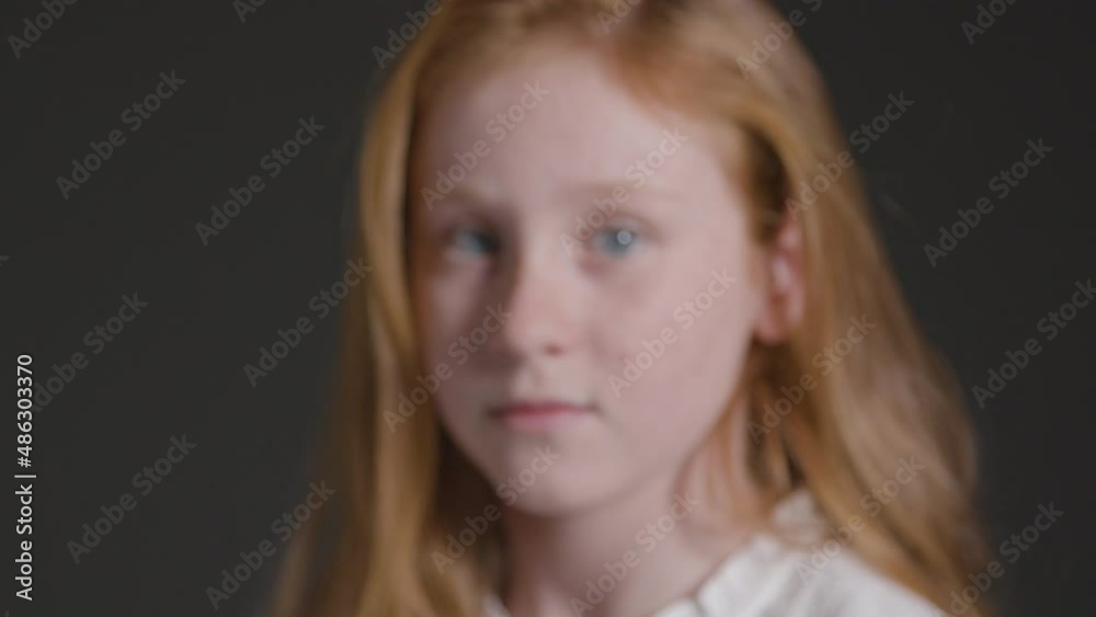 Tracking Shot of Little Girl Staring Into Camera Tracking Shot of Little Girl Staring Into Camera