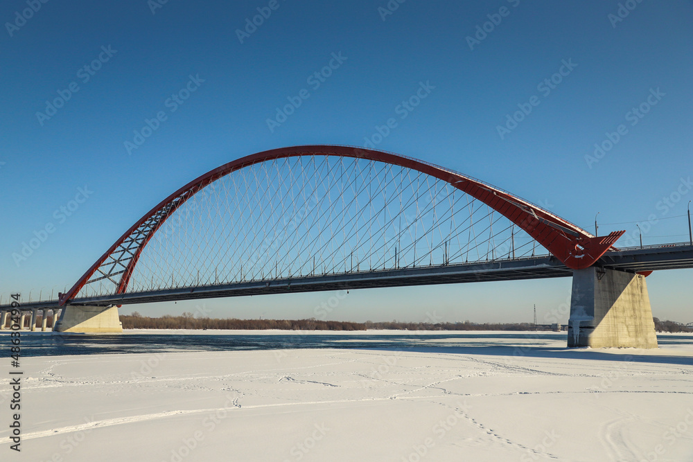 Fototapeta premium The large red arch bridge in winter close-up