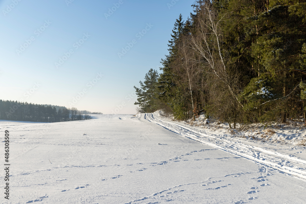 dangerous road in winter after snowfall, dangerous road in winter after snowfall,