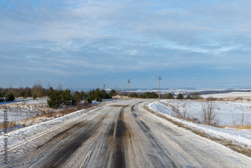 dangerous road in winter after snowfall, dangerous road in winter after snowfall,