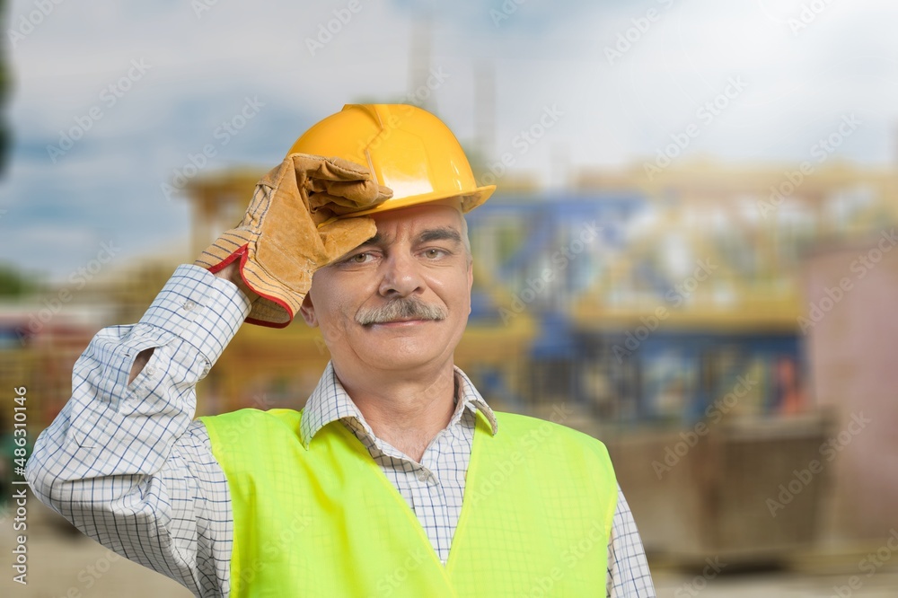 An engineer handsome man or architect looking construction site An engineer handsome man or architect looking construction site
