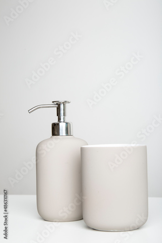 wooden eco-friendly toothbrush with cup, bathroom soap dispenser, washcloth and shower brush