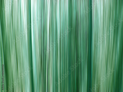 Abstract background green with vertical lines. Green stripe wallpaper. Spring wallpaper. Abstract striped colorful vertical background.