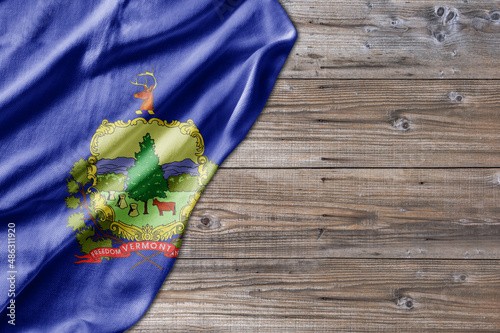 United States country state Vermont on old wooden pattern table board