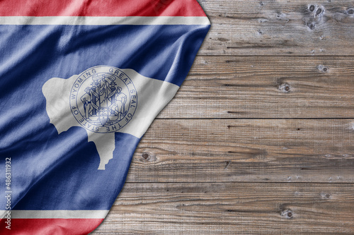 United States country state Wyoming on old wooden pattern table board