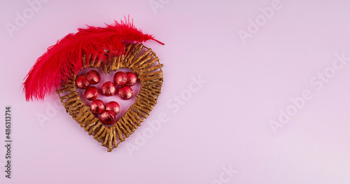 handmade wood heart with feather, copy spase