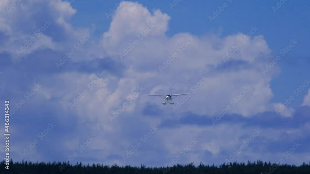 Slow motion view of a float plane landing near Le Morne in Mauritius