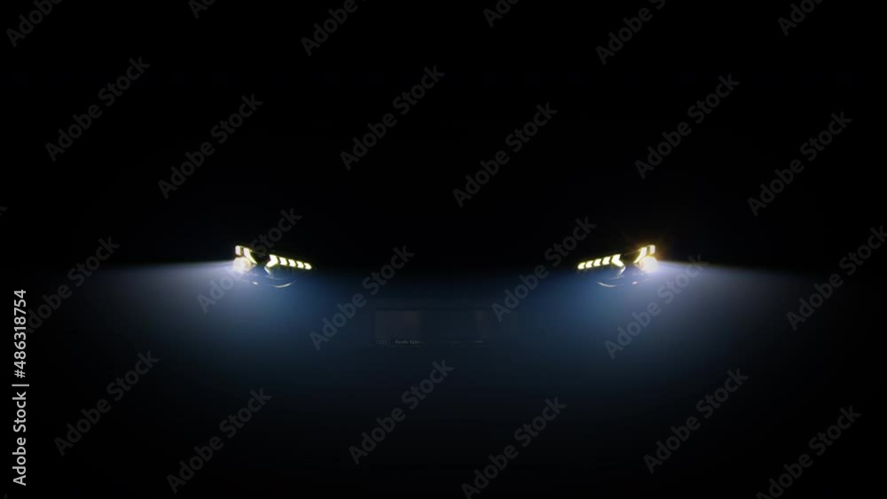 Close up of details of switched on led lights of anonymous prestigious luxury modern car. Car flashing light with blinking indicator. Car Blinker Light, car light blinking on continuously.
