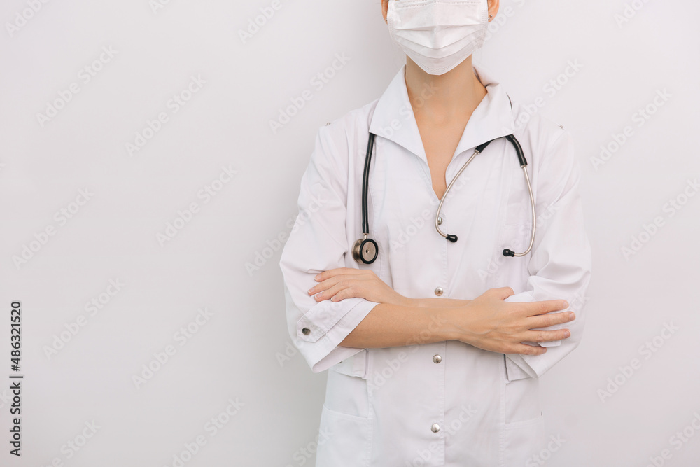 Doctor with stethoscope in medical coat on white background. Front position half body without head. Horizontal panoramic composition. Medical industry concept. Nurse in uniform healthcare concept. Doctor with stethoscope in medical coat on white background. Front position half body without head. Horizontal panoramic composition. Medical industry concept. Nurse in uniform healthcare concept.