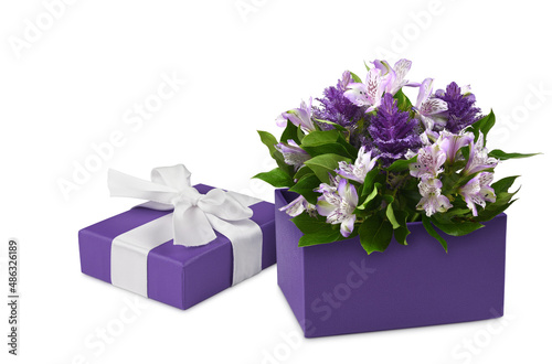 Open purple gift box with b...