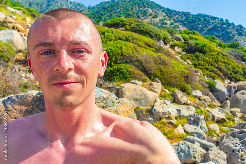 Young traveler hiker with natural coastal landscapes on Kos Greece. photo