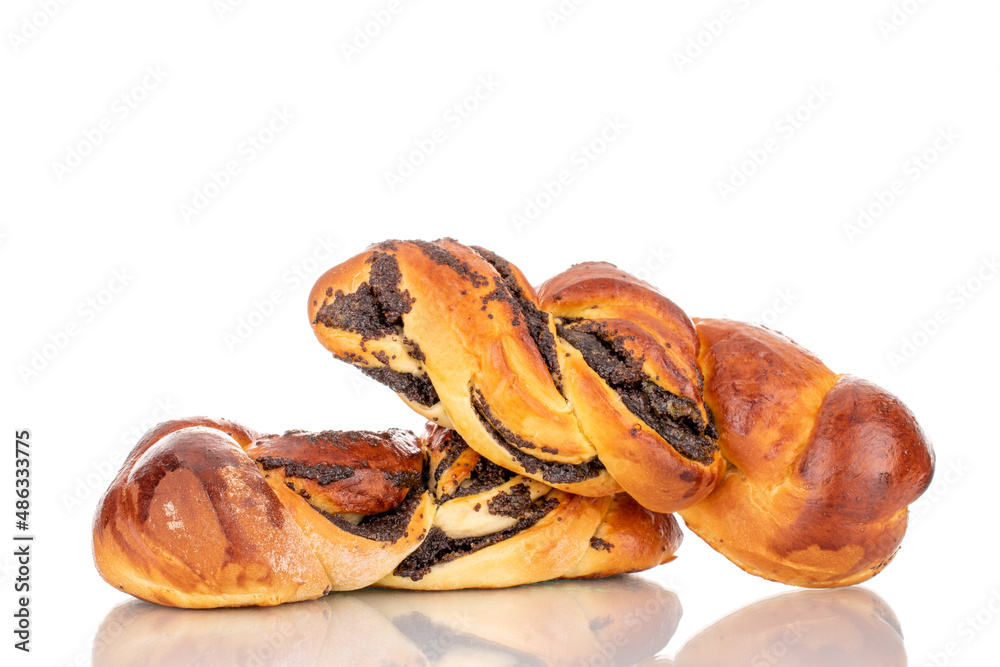 Two flavorful homemade poppy seed buns, macro, isolated on a white background.
Two flavorful homemade poppy seed buns, macro, isolated on a white background.