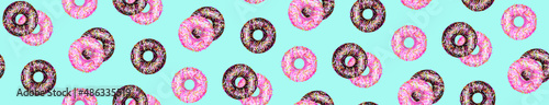 Chocolate and pink donuts on blue pattern