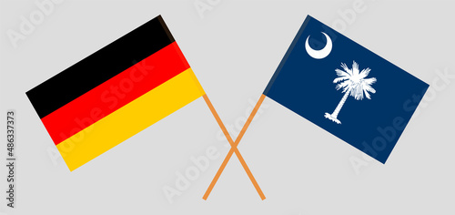 Crossed flags of Germany and The State of South Carolina. Official colors. Correct proportion