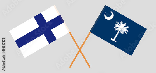Crossed flags of Finland and The State of South Carolina. Official colors. Correct proportion