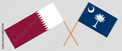 Crossed flags of Qatar and The State of South Carolina. Official colors. Correct proportion