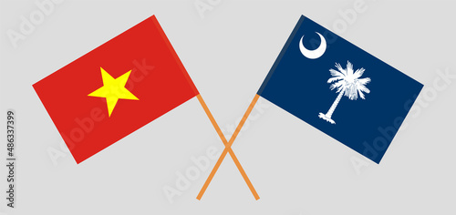 Crossed flags of Vietnam and The State of South Carolina. Official colors. Correct proportion