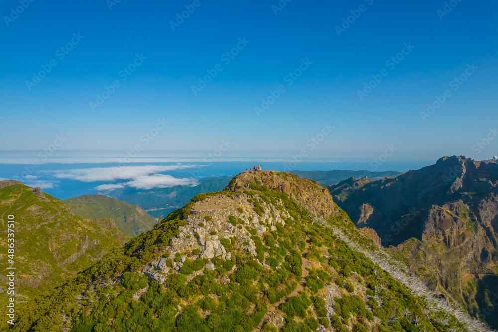 Aerial view of the peak of the Pico Ruivo - highest mountain in Madeira islands in the evening Aerial view of the peak of the Pico Ruivo - highest mountain in Madeira islands in the evening