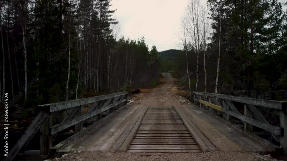 Drone Landing Norwegian Wooden Bridge Dark Forest 4K 30fps