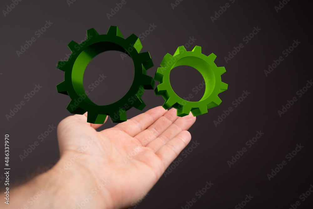 Mechanism green gears and cogs at work on black background. Industrial machinery. 3D illustration. 3D high quality rendering. Mechanism green gears and cogs at work on black background. Industrial machinery. 3D illustration. 3D high quality rendering.