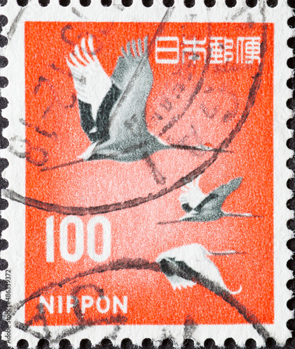 Japan - circa 1968: a postage stamp from Japan, showing the Birds of Luck Red-crowned Cranes (Grus japonensis)