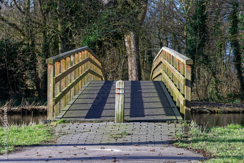 Bridge over river. Princess Beatrice Park in Schiedam. Netherlands.