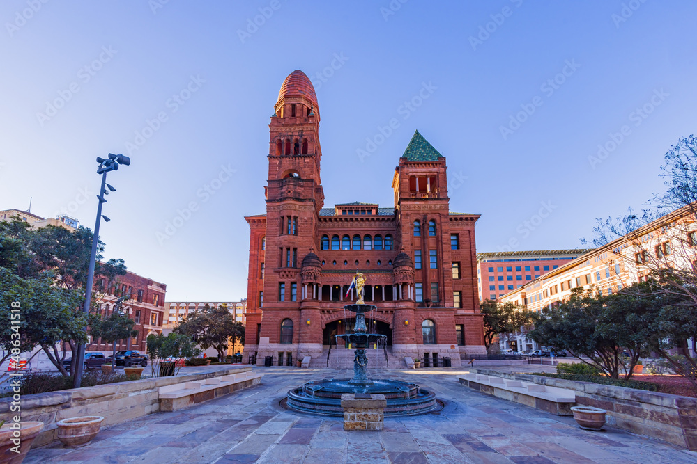 Sunny view of Courthouse building and Lady of Justice statue