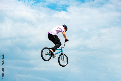 cyclist on a bike against the sky
