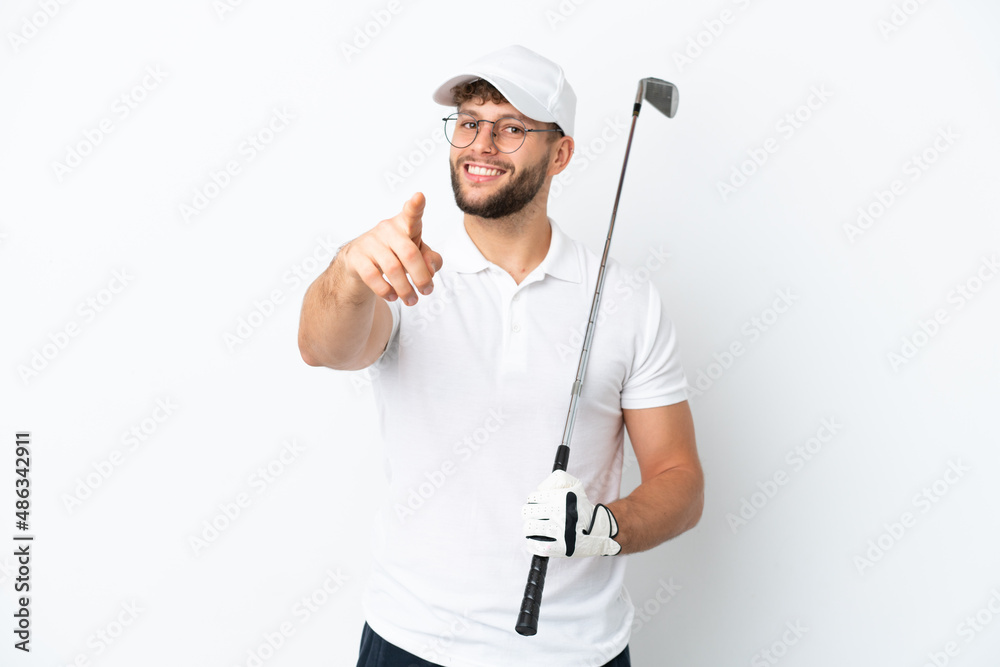 Handsome young man playing golf isolated on white background pointing front with happy expression Handsome young man playing golf isolated on white background pointing front with happy expression