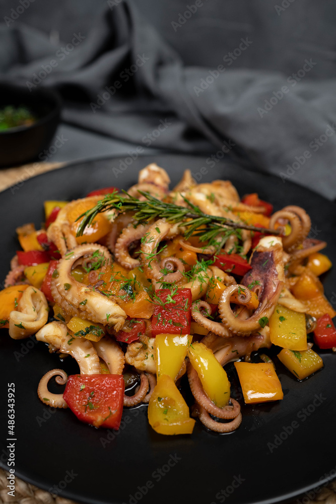 Octopus salad with herb vegetables, Fresh and healthy salad seafood squid octopus tentacles