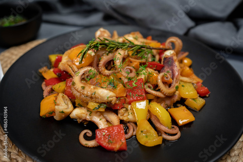 Octopus salad with herb vegetables, Fresh and healthy salad seafood squid octopus tentacles