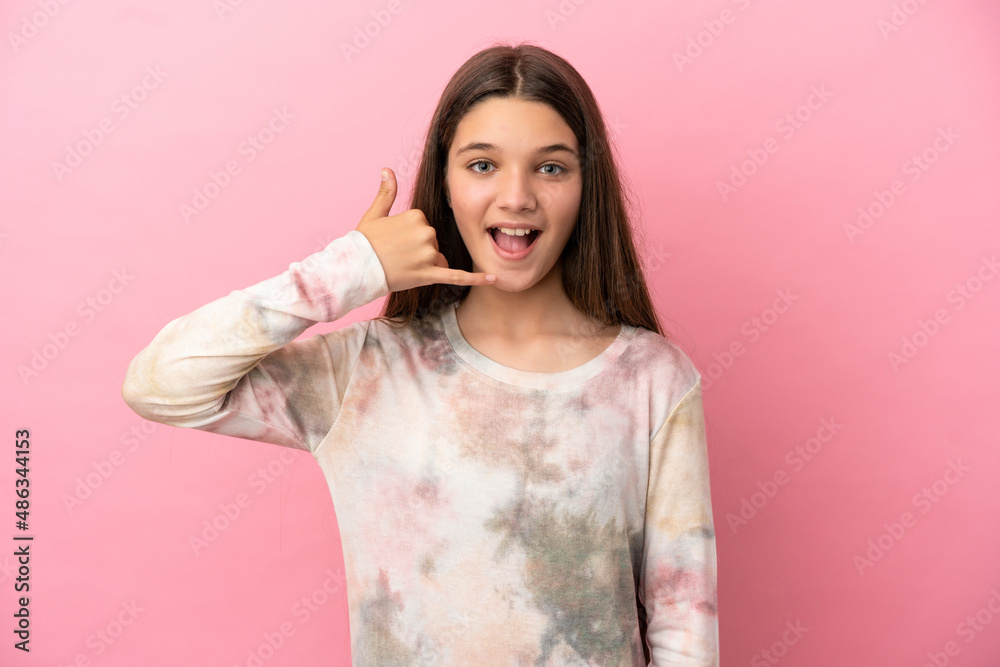 Little girl over isolated pink background making phone gesture. Call me back sign Little girl over isolated pink background making phone gesture. Call me back sign