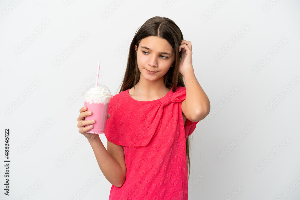 Little girl with strawberry milkshake over isolated white background having doubts Little girl with strawberry milkshake over isolated white background having doubts