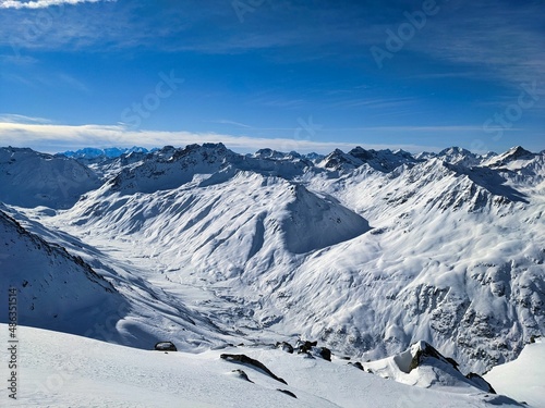 Skitour on the sentisch horn. Mountaineering in a wonderful mountain world in davos switzerland. snowy mountain peaks © SimonMichael