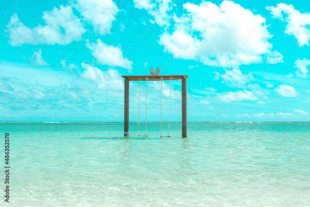 picturesque landscape in the Maldives with swings in the water picturesque landscape in the Maldives with swings in the water