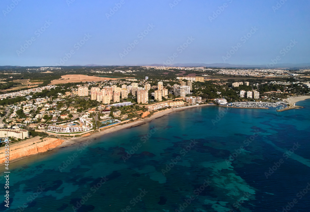 Aerial view sandy beach of Dehesa de Campoamor. Spain