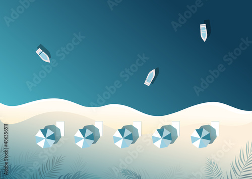 Beautiful turquoise sea with boats and catamarans. Beach with sun umbrellas and shades from palm trees. Aerial view.