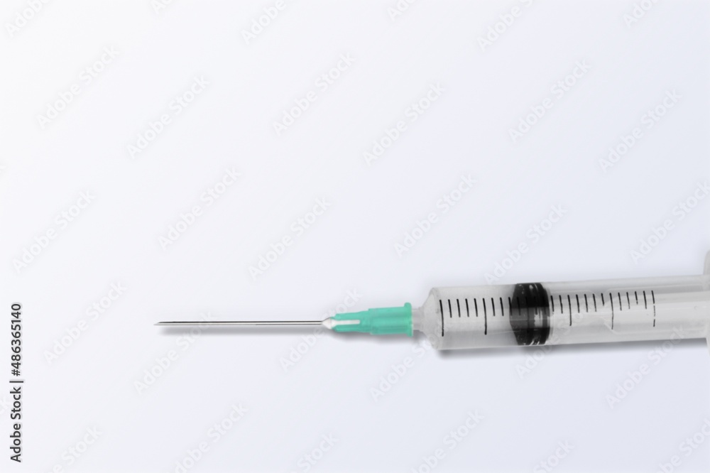 New COVID variant Omicron concept with syringe New COVID variant Omicron concept with syringe