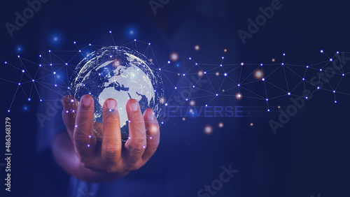 Man hand hold the virtual world. Internet connection concept with metaverse, global business and digital marketing, internet connection application technology, finance and banking, big data.