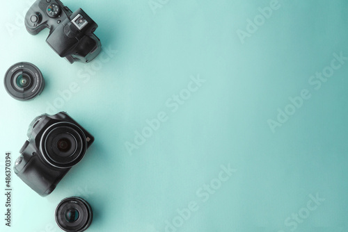 camera and lens over background photography concept.